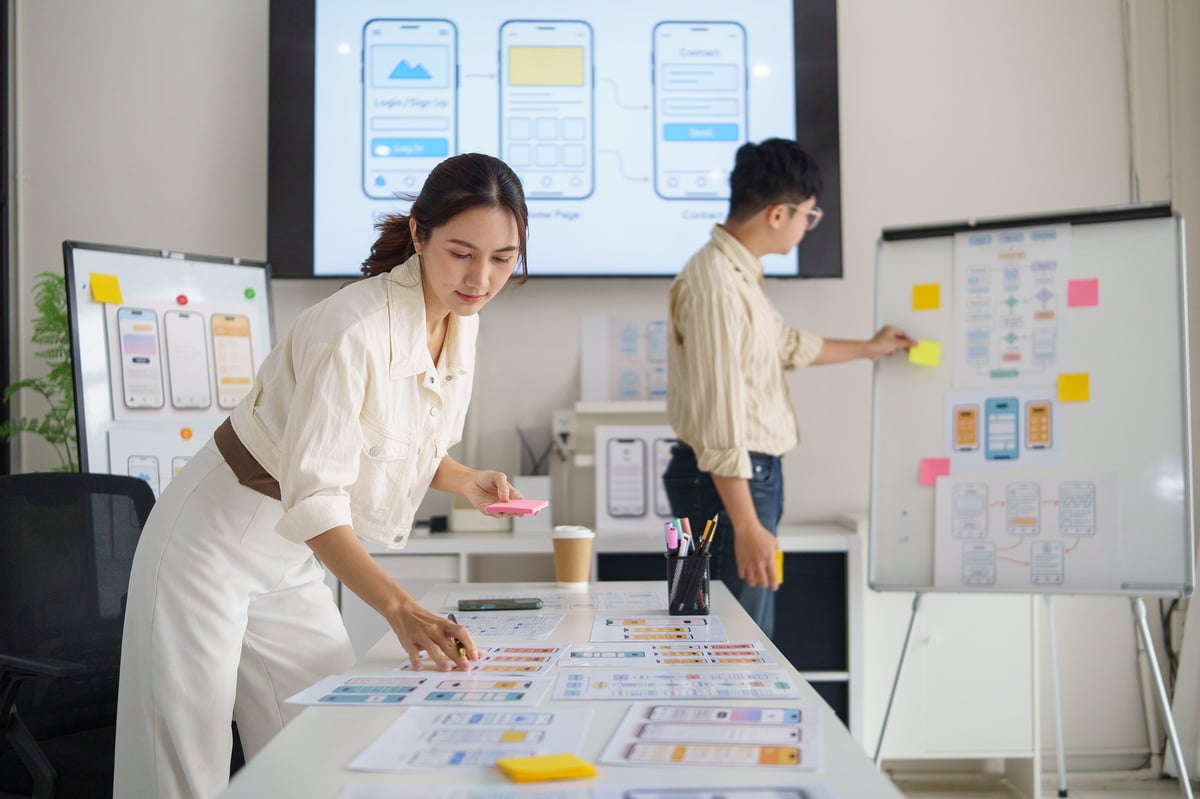Business owner reviewing website analytics on tablet